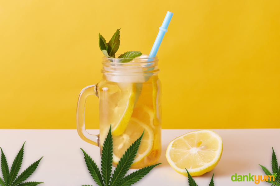 weed lemonade in a cup with straw and mint